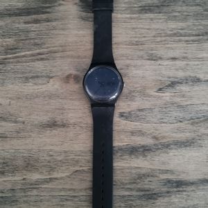 Black and navy Swatch watch